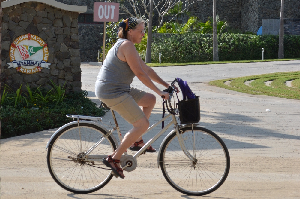 My wife riding a small Chinese ladies bike in Ngwe Saung