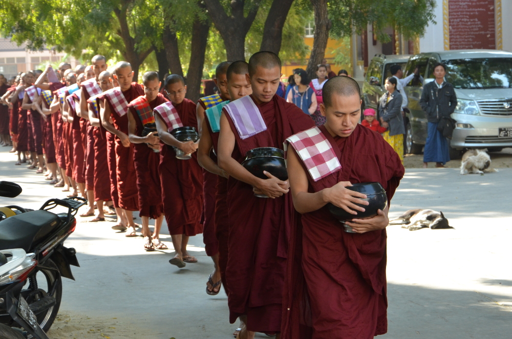 The monks line up for lunch in a strict order of age. The eldest in the front and the youngest in the rear