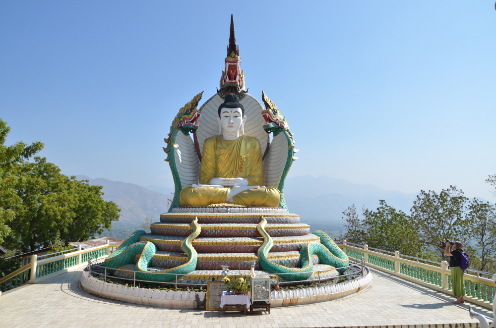 The Buddha guarded by the Cobra or Dragon meets you when you reach the summit