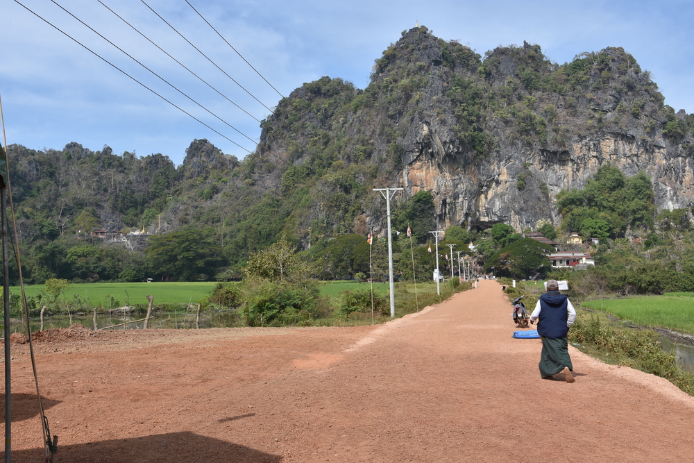 The entrance to Sadan Cave. Our driver is showing the way to the cave