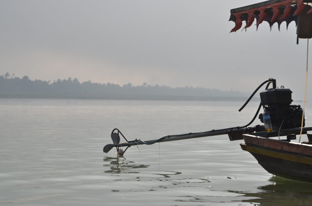 Boat on river near Mrauk-U in Myanmar